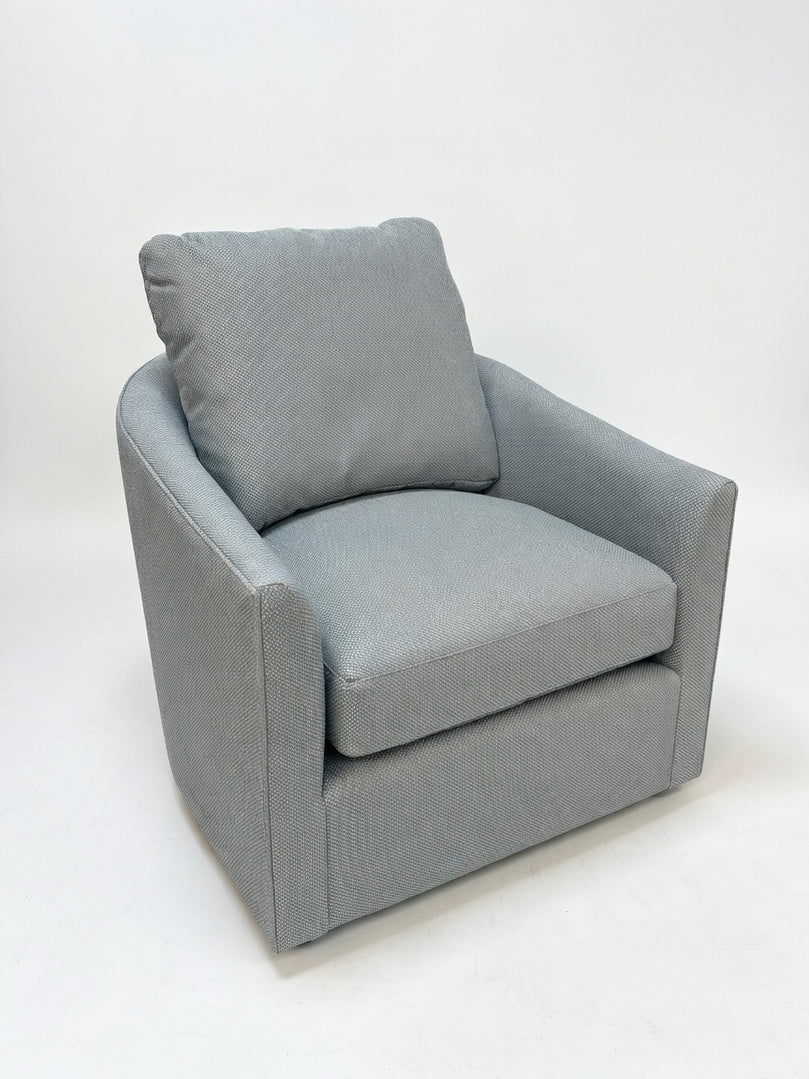 A SWIVEL CHAIR