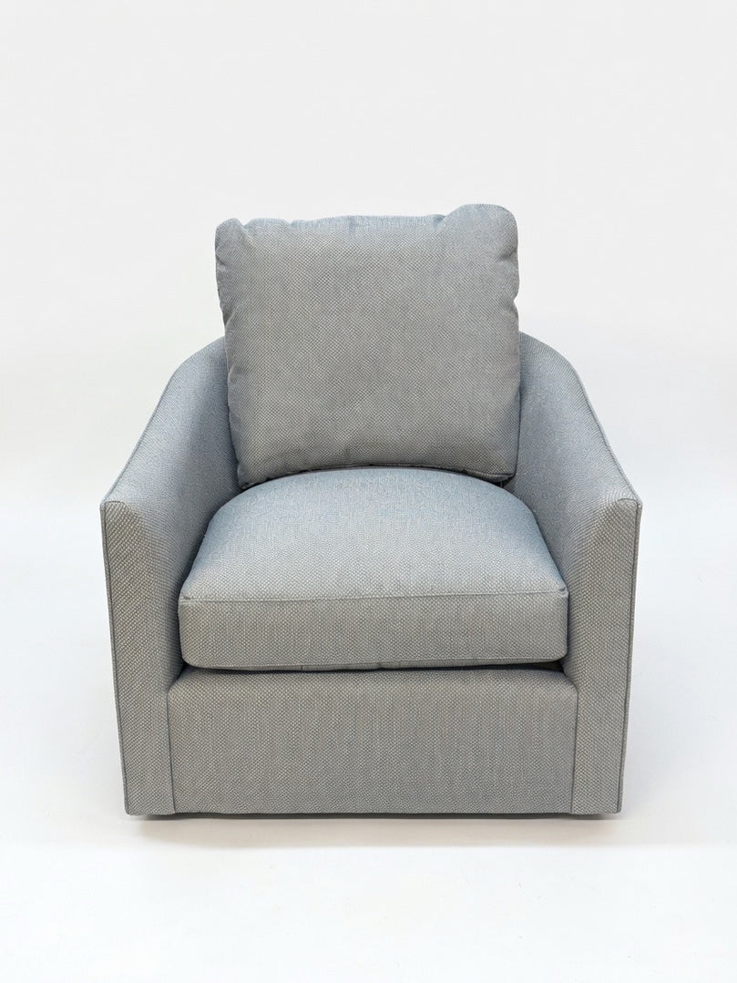 A SWIVEL CHAIR