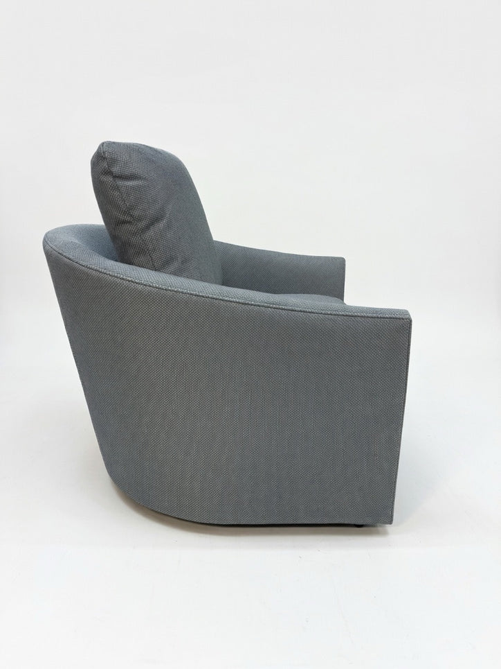 A SWIVEL CHAIR