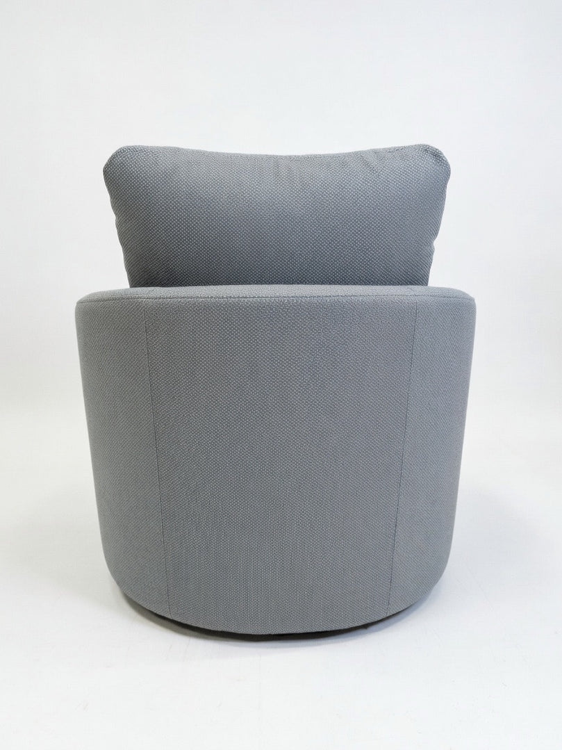 A SWIVEL CHAIR