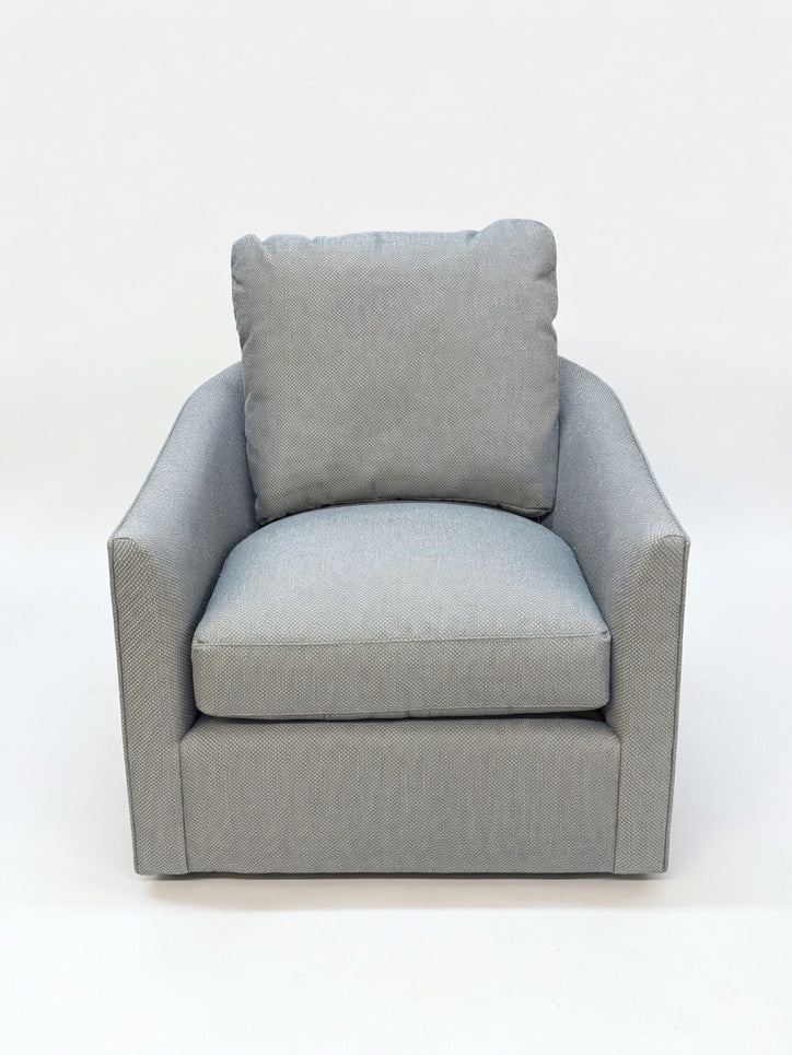 A SWIVEL CHAIR